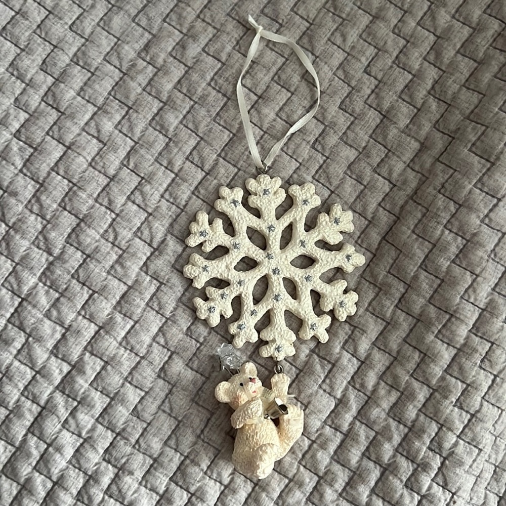 Handmade ornament snowflake and bear.